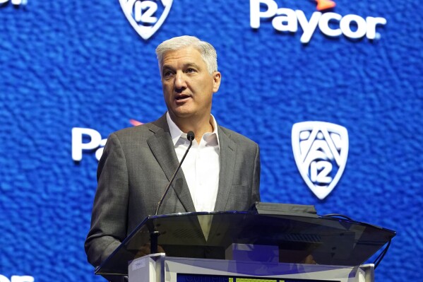 FILE - Pac-12 commissioner George Kliavkoff speaks at the NCAA college football Pac-12 media day Friday, July 21, 2023, in Las Vegas. The Pac-12 is parting ways with Commissioner George Kliavkoff after the former MGM executive oversaw the demise of the once-powerful league during a wave of conference realignment last year. The Pac-12 Board of Directors announced the move Friday, Feb. 16, 2024, in a two-sentence news release, saying the conference and Kliavkoff 鈥渕utually agreed to part ways, effective February 29, 2024.鈥�(AP Photo/Lucas Peltier, File)