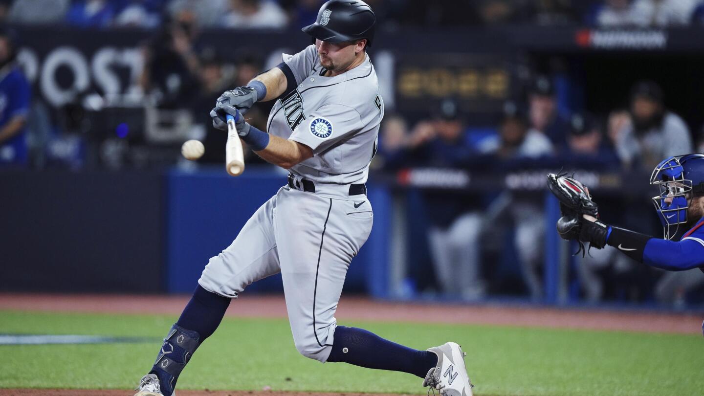 Seattle Mariners' Edgar Martinez watches his sacrifice fly to right field  in the seventh inning against the Oakland Athletics, Friday, Sept. 17,  2004, at Safeco Field in Seattle. The RBI, which scored