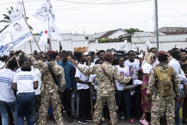 Supporters of president Felix Tshisekedi gather in a stadium to attend a campaign rally ahead of the presidential elections, in Kinshasa, Democratic Republic of the Congo, Sunday, Nov. 19, 2023. (AP Photo/Samy Ntumba Shambuyi)