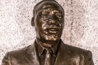 In this undated photo supplied by the U.S. Embassy in Pretoria, a bust of Martin Luther King Jr. on display at the embassy in Pretoria South Africa. The name of the Rev. Martin Luther King Jr. can be found across Africa on streets, schools, even a bridge in Burkina Faso. It is a measure of the influence of the American civil rights leader who was shot dead 50 years ago after speaking out against injustices at home and abroad. (Chris Marais/US Embassy South Africa via AP)