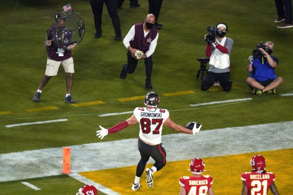 Tampa Bay Buccaneers' Rob Gronkowski (87) reacts after scoring a touchdown during the first half of the NFL Super Bowl 55 football game against the Kansas City Chiefs, Sunday, Feb. 7, 2021, in Tampa, Fla. (AP Photo/Charlie Riedel)