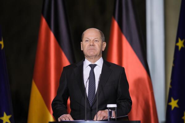 German Chancellor Olaf Scholz briefs the media after a virtual meeting of the G7 leaders, at the chancellery in Berlin, Germany, Monday, Dec. 12, 2022. (AP Photo/Markus Schreiber)