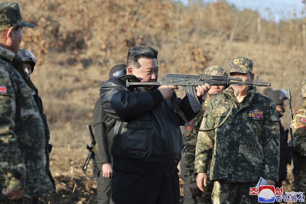 In this photo provided by the North Korean government, North Korean leader Kim Jong Un, center, visits a western operational training base in North Korea Wednesday, March 6, 2024. Independent journalists were not given access to cover the event depicted in this image distributed by the North Korean government. The content of this image is as provided and cannot be independently verified. Korean language watermark on image as provided by source reads: "KCNA" which is the abbreviation for Korean Central News Agency. (Korean Central News Agency/Korea News Service via AP)