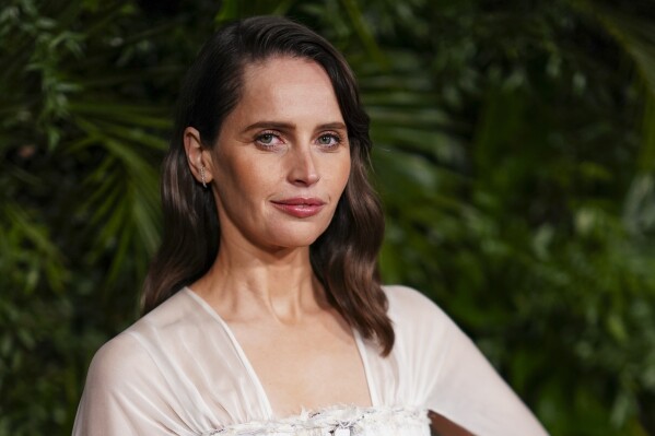 Felicity Jones arrives at Chanel's 16th Annual Pre-Oscar Awards Dinner on Saturday, March 1, 2025, at The Beverly Hills Hotel in Beverly Hills, Calif. (Photo by Jordan Strauss/Invision/AP)