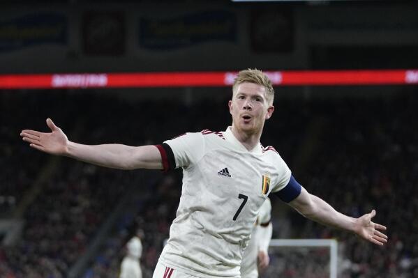 FILE - Belgium's Kevin De Bruyne celebrates after scoring his side's opening goal during the World Cup 2022 group E qualifying soccer match between Wales and Belgium at Cardiff City stadium in Cardiff, Wales, Tuesday, Nov. 16, 2021. (AP Photo/Frank Augstein, File)