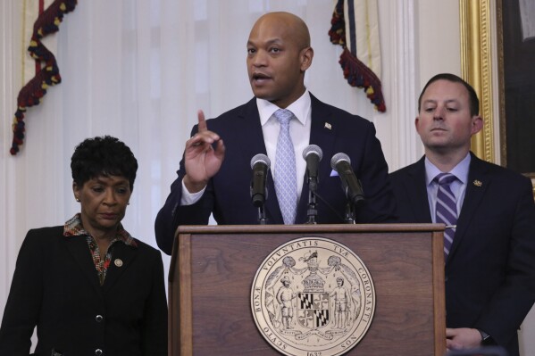 Maryland Gov. Wes Moore speaks at a bill-signing ceremony on Thursday, May 9, 2024, in Annapolis, Md., where he signed two measures into law that are aimed at safeguarding personal data online from Big Tech, including a bill making Maryland the second state to create strong limits on information collected on children. Maryland House Speaker Adrienne Jones is standing left, and Maryland Senate President Bill Ferguson is standing right. (AP Photo/Brian Witte)