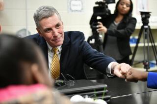 FILE - In this Feb. 21, 2019, file photo, U.S. Rep. Tom Rice, R-South Carolina, talks with students in Florence School District Four in Florence, S.C. Rice says that he hopes his vote in 2021 to impeach President Donald Trump won’t be enough to overshadow his other accomplishments as he seeks a sixth term. (AP Photo/Meg Kinnard, File)
