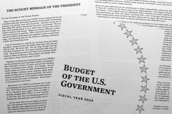 President Joe Biden's budget for fiscal year 2024 is photographed Thursday, March 9, 2023. As political gridlock puts the government at risk of defaulting, Biden is making an opening offer with a budget plan that would cut deficits by $2.9 trillion over the next decade — a proposal that Republicans already intend to reject. (AP Photo/Jon Elswick)