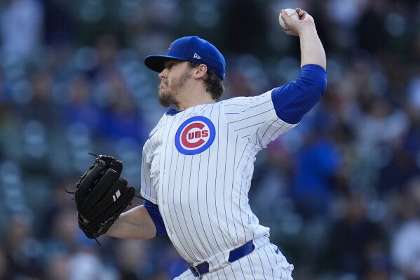 CORRECTS TO JUSTIN STEELE NOT JUSTINE STEELE - Chicago Cubs starting pitcher Justin Steele throws agains the San Diego Padres during the first inning of a baseball game Monday, May 6, 2024, in Chicago. (AP Photo/Erin Hooley)