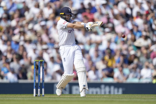 England's Joe Root plays a shot on day three of the fifth Ashes Test match between England and Australia, at The Oval cricket ground in London, Saturday, July 29, 2023. (AP Photo/Kirsty Wigglesworth)