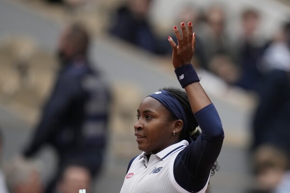 Coco Gauff of the U.S. celebrates after her their third round match of the French Open tennis tournament against Ukraine's Dayana Yastremska at the Roland Garros stadium in Paris, Friday, May 31, 2024. (AP Photo/Christophe Ena)