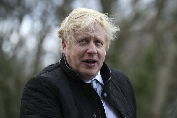 Britain's Prime Minister Boris Johnson arrives for a visit to Healey's Cornish Cyder Farm during the General Election campaign, in Callestick, England, Wednesday, Nov. 27, 2019 (Dan Kitwood/Pool Photo via AP)