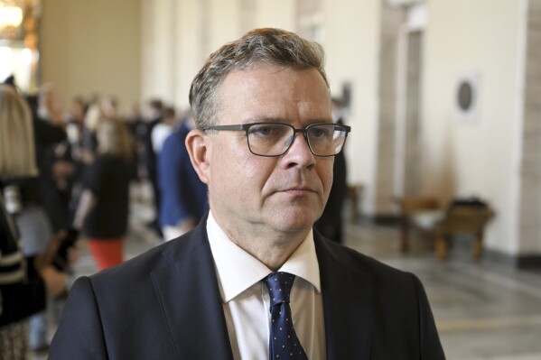 Finnish Prime Minister Petteri Orpo meets the media after his government's non-confidence vote at the Parliament of Finland in Helsinki on Friday, Sept. 8, 2023. (Vesa Moilanen/Lehtikuva via AP)