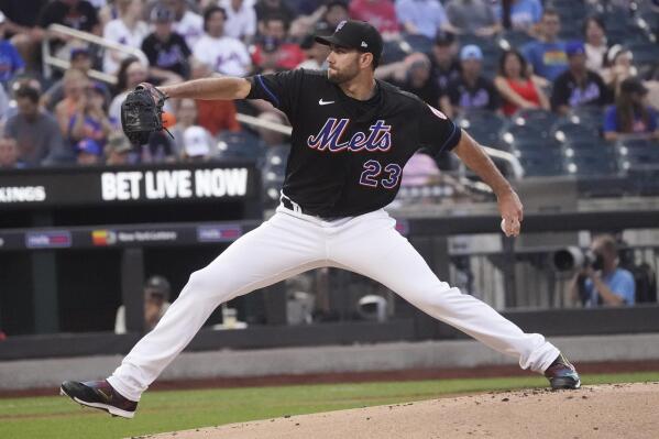 New York Mets' David Peterson pitches to a Texas Rangers batter during the first inning of a baseball game Friday, July 1, 2022, in New York. (AP Photo/Bebeto Matthews)