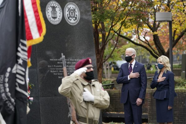 President-elect Joe Biden and Jill Biden, attend a service at the Philadelphia Korean War Memorial at Penn's Landing on Veterans Day, Wednesday, Nov. 11, 2020, in Philadelphia. (AP Photo/Alex Brandon)