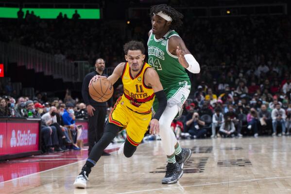 The shoes of Boston Celtics guard Jaylen Brown (7) on the court against the  Atlanta Hawks during the second half during game four of the 2023 NBA  playoffs at State Farm Arena.