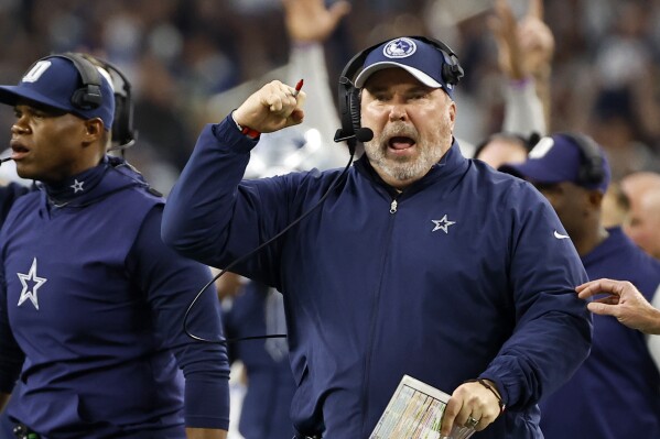 Dallas Cowboys head coach Mike McCarthy, celebrates after running back Tony Pollard ran the ball for a touchdown in the second half of an NFL football game against the Seattle Seahawks in Arlington, Texas, Thursday, Nov. 30, 2023. (APPhoto/Roger Steinman)