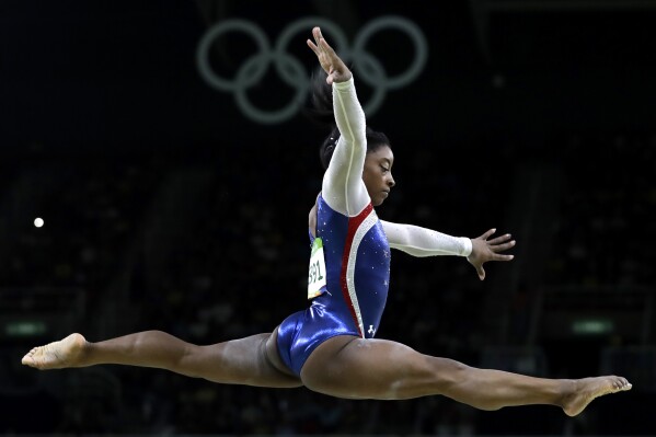 FILE - United States' Simone Biles performs on the balance beam during the artistic gymnastics women's individual all-around final at the 2016 Summer Olympics in Rio de Janeiro, Brazil, Aug. 11, 2016. Biles is returning to competition at the U.S. Classic on Saturday, two years after a bought with "the twisties" forced her to remove herself from several events at the Tokyo Olympics. (AP Photo/Rebecca Blackwell, File)