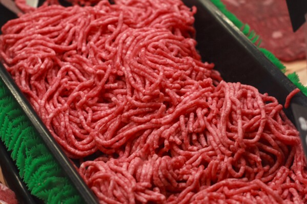 FILE - Ground beef is displayed for sale at a market in Washington, Saturday, April 1, 2017. The U.S. Department of Agriculture will test ground beef samples for bird flu particles, though officials said Tuesday, April 30, 2024, they're confident the nation's meat supply is safe. (AP Photo/J. Scott Applewhite, File)
