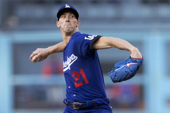 Los Angeles Dodgers starting pitcher Walker Buehler throws to a New York Mets batter during the first inning of a baseball game in Los Angeles, Saturday, June 4, 2022. (AP Photo/Alex Gallardo)