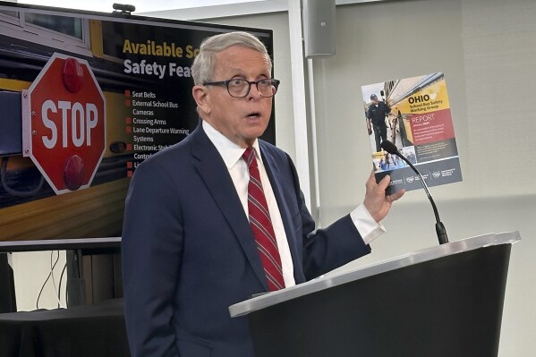 Ohio Gov. Mike DeWine discusses the final report of a working group on school bus safety Wednesday, Jan. 31, 2024, at the Ohio Department of Public Safety in Columbus, Ohio. (AP Photo/Julie Carr Smyth)