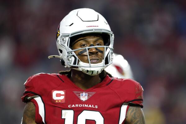 FILE - Arizona Cardinals wide receiver DeAndre Hopkins looks to the sideline during a timeout in second half of an NFL football game against the Los Angeles Rams, Dec. 13, 2021, in Glendale, Ariz. Cardinals three-time All-Pro receiver Hopkins has been suspended six games for violating the NFL’s policy on performance-enhancing substances. (AP Photo/Ralph Freso, File)