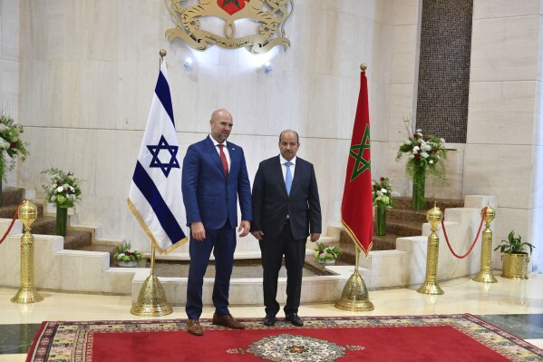 FILE - Enaam Mayara, right, Morocco's senate president poses for a photo with Israel's Knesset speaker Amir Ohana, during the latter's visit to Rabat, Morocco, Tuesday, June, 8, 2023. Morocco's senate president has postponed a historic visit to Israel due to health reasons. Israel officials announced the delay on Wednesday, Sept. 6, 2023, a day before Enaam Mayara's scheduled visit to Israel's Knesset, or parliament. (AP Photo, File)