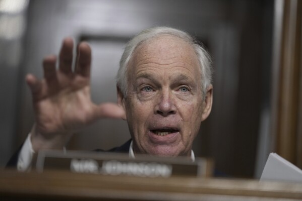 Sen. Ron Johnson, R-Wisc., questions Robert F. Kennedy Jr., President Donald Trump's choice to be Secretary of Health and Human Services, as he appears before the Senate Finance Committee for his confirmation hearing, at the Capitol in Washington, Wednesday, Jan. 29, 2025. (AP Photo/Ben Curtis)