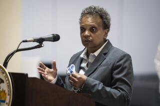FILE - In this Monday, May 10, 2021, file photo, Mayor Lori Lightfoot speaks during a news conference in Chicago. A white reporter for a conservative media outlet is suing Lightfoot over her decision to grant interviews at the midpoint of her first term only to journalists of color, saying she discriminated against him because of his race. Thomas Catenacci and his employer, the Daily Caller News Foundation, argue in the lawsuit filed Thursday, May, 27 that Lightfoot violated their First Amendment rights and Catenacci's right to equal protection. (Ashlee Rezin Garcia/Chicago Sun-Times via AP, File)