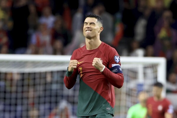FILE - Portugal's Cristiano Ronaldo celebrates at the end of the Euro 2024 group J qualifying soccer match between Portugal and Slovakia at the Dragao stadium in Porto, Portugal, Friday, Oct. 13, 2023. The European Championship represents an opportunity for Cristiano Ronaldo to remind soccer fans that he is still a force in the game. (AP Photo/Luis Vieira, File)