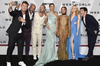 FILE - Luke Hemsworth, left, Jeffrey Wright, Aaron Paul, Angela Sarafyan, Tessa Thompson, Evan Rachel Wood and James Marsden attend the premiere of HBO's "Westworld" Season 4 at Alice Tully Hall on Tuesday, June 21, 2022, in New York. (Photo by Evan Agostini/Invision/AP, File)