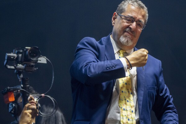 Bernardo Arévalo, presidential candidate with Seed Movement party, gestures after delivering his speech during the closing campaign rally at Constitution square in Guatemala City, Wednesday, Aug. 16, 2023. Arevalo faces rival and former first lady Sandra Torres of the UNE party in the Aug. 20 runoff election. (AP Photo/Moises Castillo)