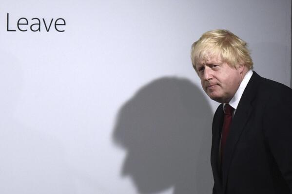 FILE - Vote Leave campaigner Boris Johnson arrives for a press conference at Vote Leave headquarters in London Friday, June 24, 2016. British media say Prime Minister Boris Johnson has agreed to resign on Thursday, July 7 2022, ending an unprecedented political crisis over his future. (Mary Turner/Pool via AP, File)