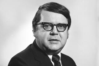 FILE - This file photo, date and location not known, provided by the Bentley Historical Library at the University of Michigan, shows Dr. Robert E. Anderson. A son of legendary University of Michigan football coach Bo Schembechler was among the hundreds of men who were sexually assaulted by Anderson, a campus doctor, and he will speak publicly about the abuse along with two players who also were victims in the 1970s and '80s, lawyers said Wednesday, June 9, 2021. (Robert Kalmbach/Bentley Historical Library University of Michigan via AP, File)