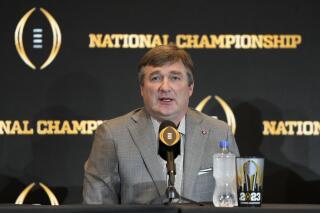 FILE -Georgia head coach Kirby Smart speaks to reporters during a press conference the day after winning the national championship NCAA College Football Playoff game against TCU, Tuesday, Jan. 10, 2023, in Los Angeles, Calif. Georgia's national championship football team is declining an invitation to visit the White House. According to a statement released by the Georgia athletic association, the Bulldogs will not be able to attend a June 12 event with other college teams at the White House described by President Joe Biden and first lady Jill Biden as “College Athlete Day.”(AP Photo/Ashley Landis, File)