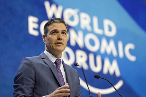 FILE - Spain's Prime Minister Pedro Sanchez delivers his speech during the World Economic Forum in Davos, Switzerland, on May 24, 2022. The Spanish government will tighten judicial control over the country’s intelligence agency. Prime Minister Pedro Sánchez made the announcement Thursday, weeks after the agency admitted it had spied on several pro-independence supporters in Catalonia with judicial authorization. (AP Photo/Markus Schreiber, File)