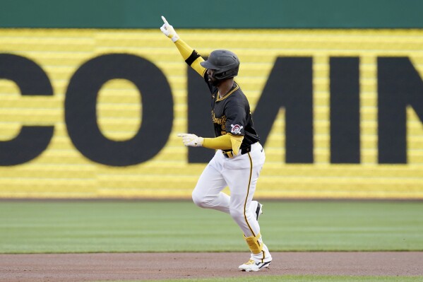 Pittsburgh Pirates' Andrew McCutchen runs the bases after hitting a home run against the Milwaukee Brewers during the first inning of a baseball game Tuesday, April 23, 2024, in Pittsburgh. (AP Photo/Matt Freed)