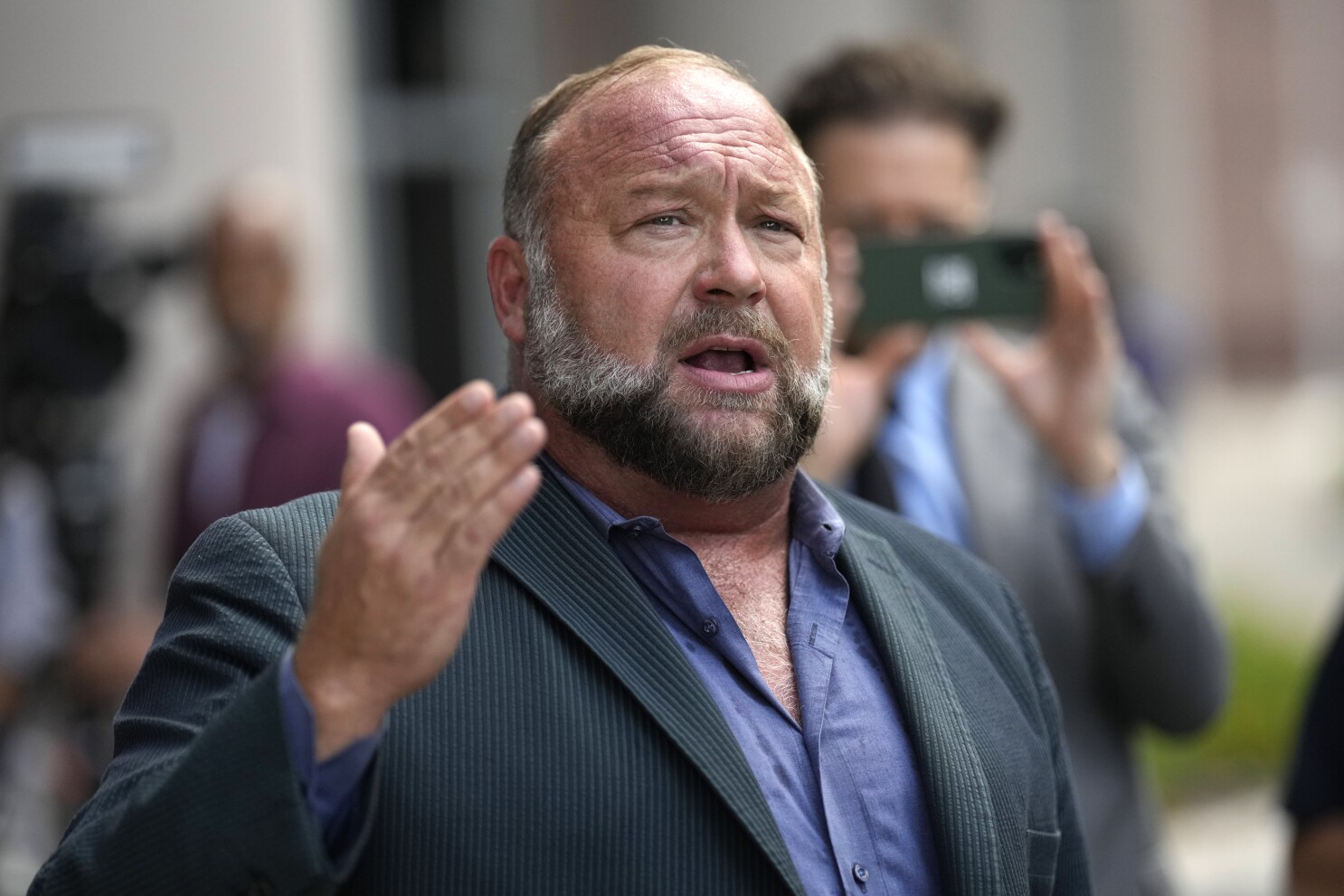 Sale of Alex Jones' Infowars to The Onion rejected | AP News