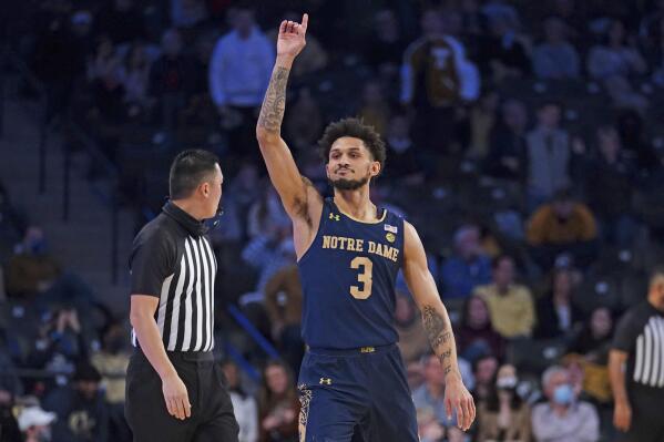 Notre Dame guard Prentiss Hubb (3) gestures after defeating Georgia Tech in overtime of an NCAA college basketball game Saturday, Jan. 8, 2022, in Atlanta. (AP Photo/John Bazemore)
