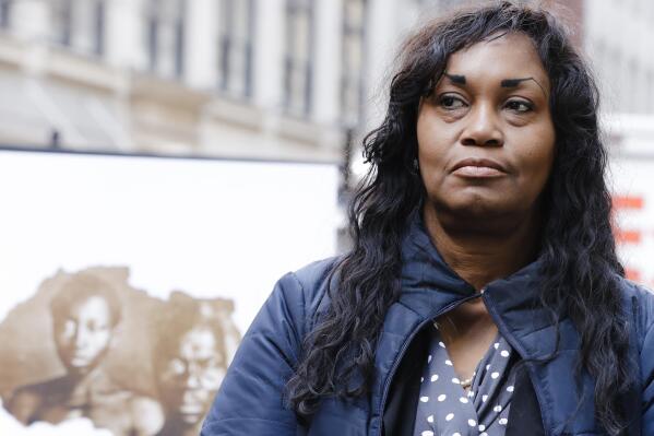 Tamara Lanier attends a news conference near the Harvard Club Wednesday, March 20, 2019, in New York. Lanier, who says she's descended from slaves portrayed in widely-published, historical photos owned by Harvard, can sue the Ivy League university for emotional distress, Massachusetts' highest court ruled Thursday June 23, 2022. The state's Supreme Judicial Court partly vacated a lower court ruling that dismissed a complaint from Tamara Lanier over photos she says depict her enslaved ancestors. The images are considered some of the earliest showing enslaved people in the United States. (AP Photo/Frank Franklin II, File)