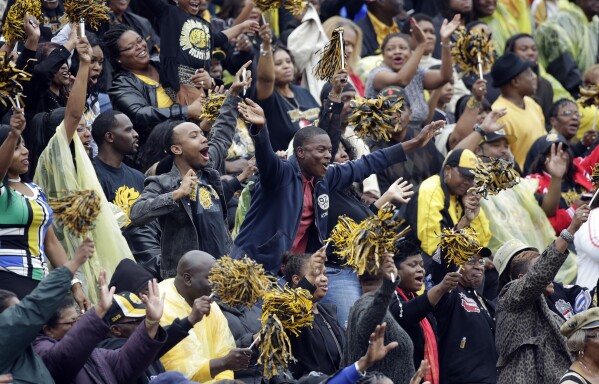 FILE - Arkansas Pine Bluff fans cheer for their team in the first half of the SWAC Championship NCAA college football game against Jackson State at Legion Field in Birmingham, Ala., Saturday, Dec. 8, 2012. (AP Photo/Dave Martin, File)
