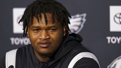 Philadelphia Eagles first round draft pick Jalen Carter, from the University of Georgia, takes questions from the media during NFL rookie football minicamp, Friday, May 5, 2023, in Philadelphia. Victoria S. Bowles, who was seriously injured in the January car crash that killed Georgia offensive lineman Devin Willock and an athletics staffer, has sued the school’s athletics association and former Bulldogs defensive tackle Jalen Carter for damages. (AP Photo/Chris Szagola)