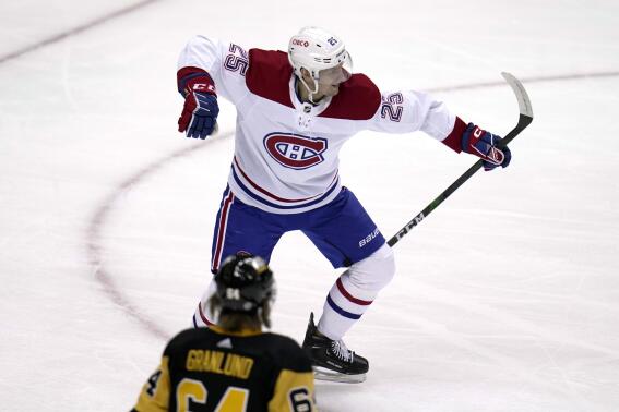 Montreal Canadiens' Denis Gurianov (25) celebrates his goal against the Pittsburgh Penguins during the first period of an NHL hockey game in Pittsburgh, Tuesday, March 14, 2023. (AP Photo/Gene J. Puskar)