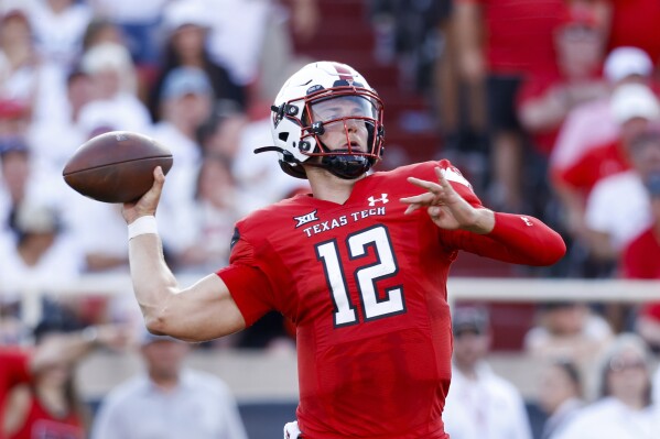 FILE - Texas Tech quarterback Tyler Shough throws a pass against Oregon during the first half of an NCAA college football game Sept. 9, 2023, in Lubbock, Texas. Former Texas Tech quarterback Shough says on social media that he will transfer to Louisville after a three-year stint with the Red Raiders. (APPhoto/Chase Seabolt, File)