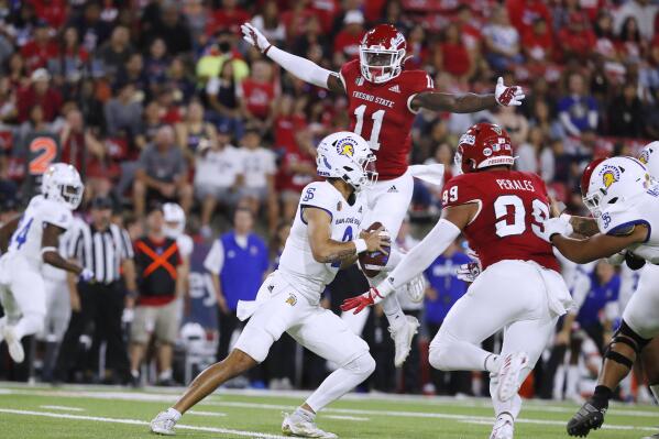 San Jose State quarterback Chevan Cordeiro is pressured by Fresno State defensive back Cale Sanders Jr. during the first half of an NCAA college football game in Fresno, Calif., Saturday, Oct. 15, 2022. (AP Photo/Gary Kazanjian)
