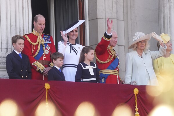From left, Britain's Prince George, Prince William, Prince Louis, Kate, Princess of Wales, Princess Charlotte, King Charles III, Queen Camilla and Sophie, Duchess of Edinburgh on the balcony of Buckingham Palace to view the flypast following the Trooping the Color ceremony in London, Saturday, June 15, 2024. Trooping the Color is the King's Birthday Parade and one of the nation's most impressive and iconic annual events attended by almost every member of the Royal Family. (James Manning/PA via AP)