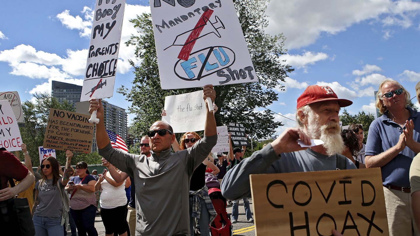 Protesters clash over mask and vaccine mandates at Boston Common