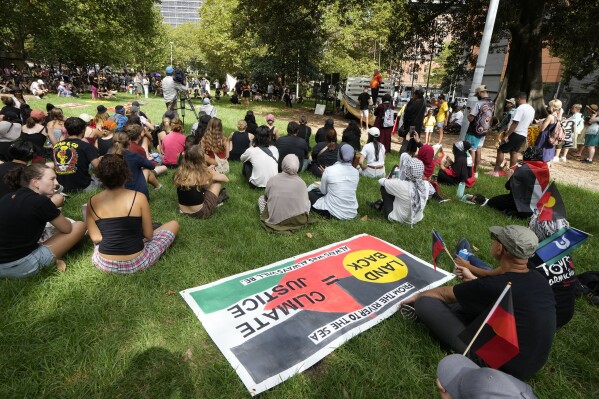 People attend an Indigenous Australians protest during Australia Day in Sydney, Friday, Jan. 26, 2024. (AP Photo/Rick Rycroft)