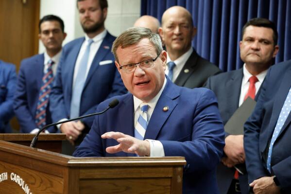 FILE - N.C. State House Speaker Tim Moore answers questions during a press conference about the House Republican state budget proposal on March 29, 2023, in Raleigh, N.C. The North Carolina House voted on Wednesday, April 5, 2023 for a Republican-backed budget measure that would fund the state government for the next two years, including billions in spending for infrastructure and mental health and attempts to address inflation and job vacancies with pay raises. (Ethan Hyman/The News & Observer via AP, File)