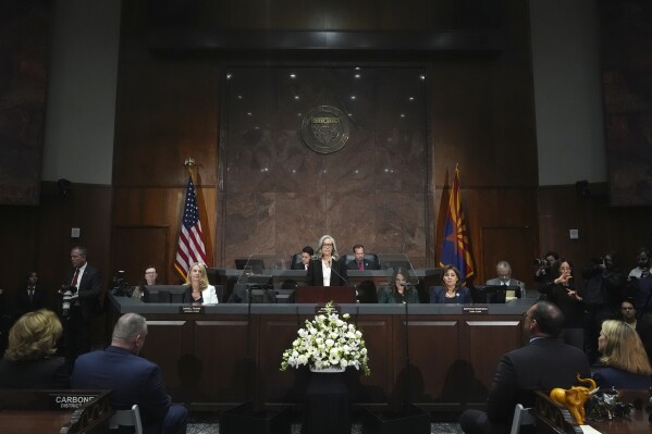 Arizona Democratic Gov. Katie Hobbs gives the State of the State address in the House of Representatives at the Capitol Monday, Jan. 13, 2025, in Phoenix. (AP Photo/Ross D. Franklin)